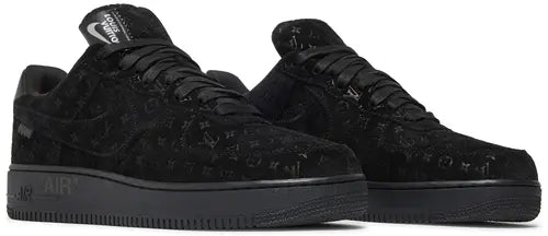 Black sneakers with a textured pattern on a white background
