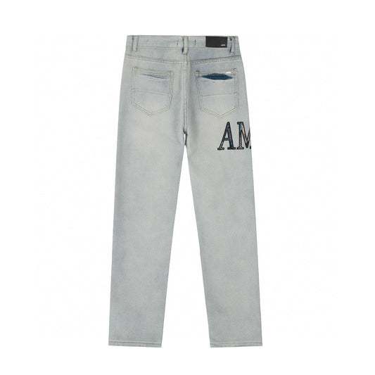 Amiri | MX1 Leather Patch Distressed Jeans | Indigo