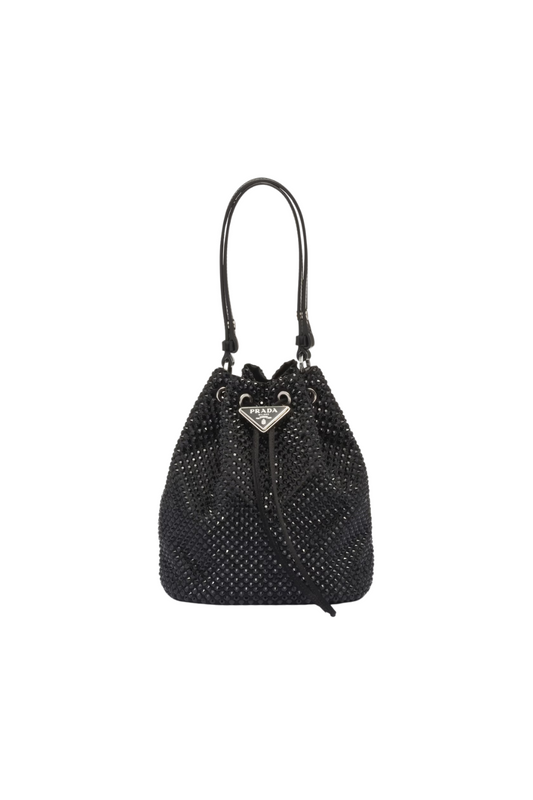 Black woven handbag with a Prada logo on a white background