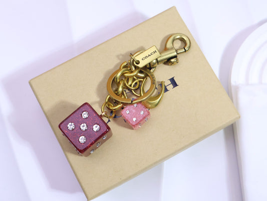 Coach | Glitter Dice Charm | Red & Pink