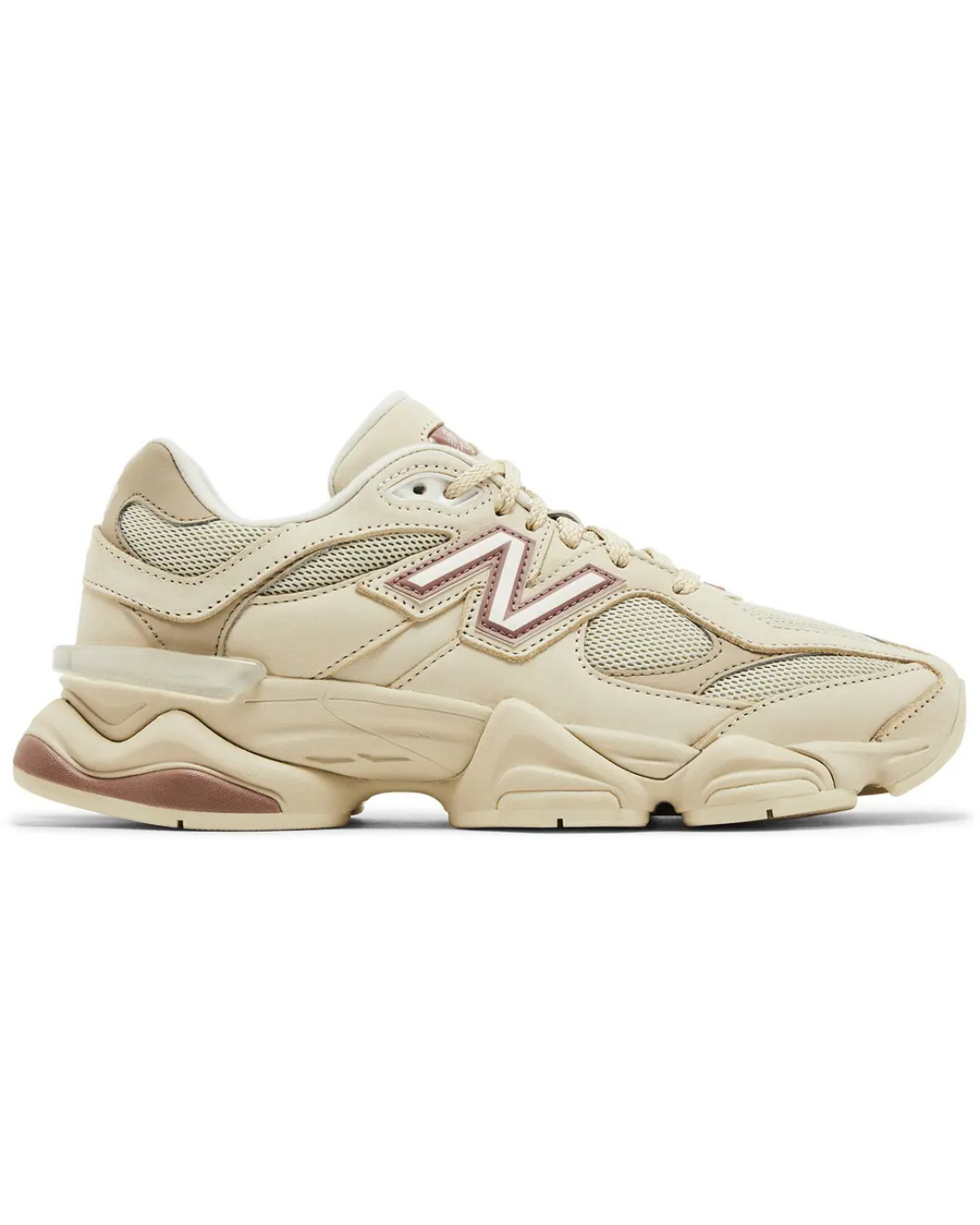 Beige sneaker with pink accents on a white background