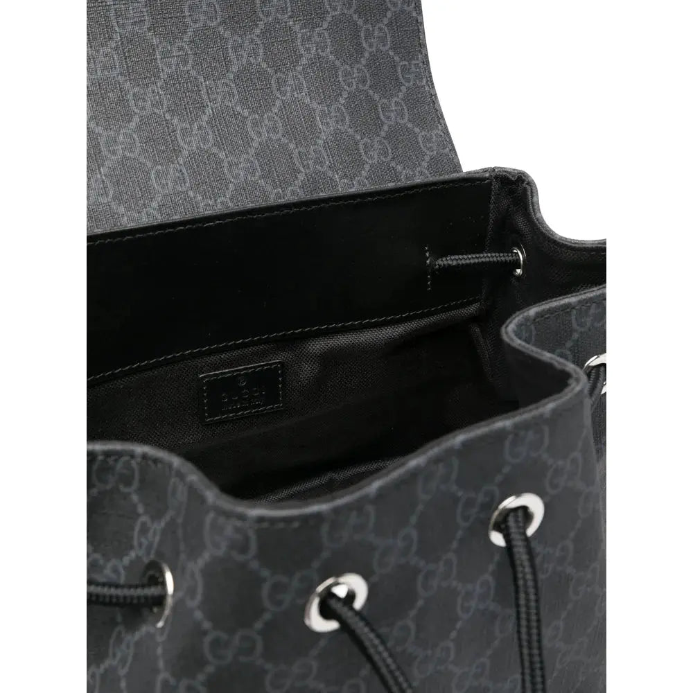 Gucci | Black GG Monogram Canvas Backpack with Web Stripe Gucci