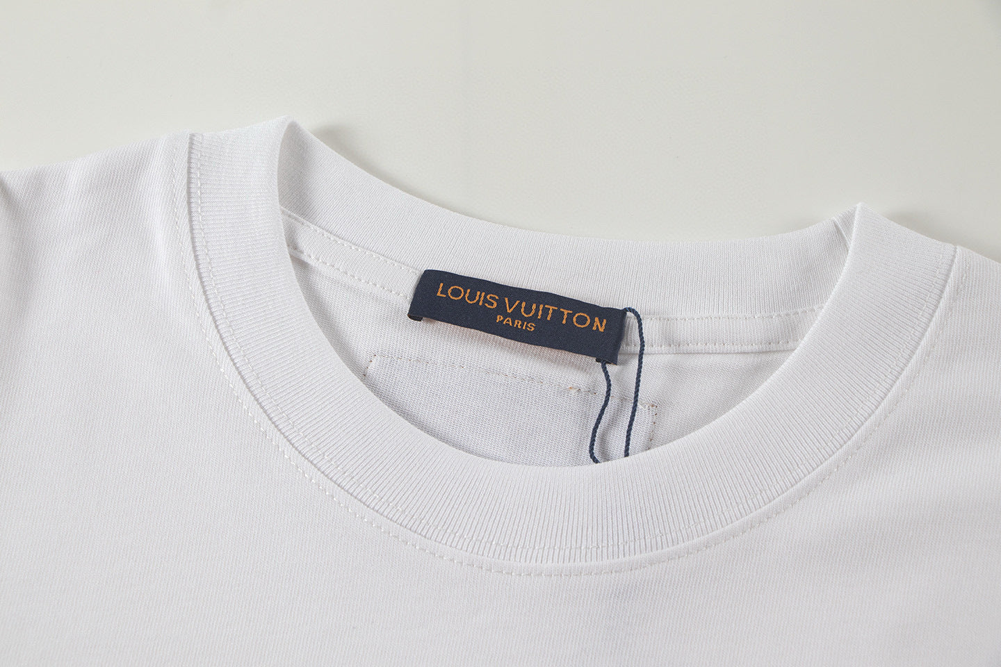 Louis Vuitton | Embossed LV Long-Sleeved T-Shirt in Black & White