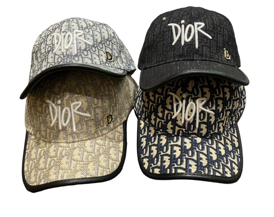 Two Dior baseball caps with logo patterns on a white background