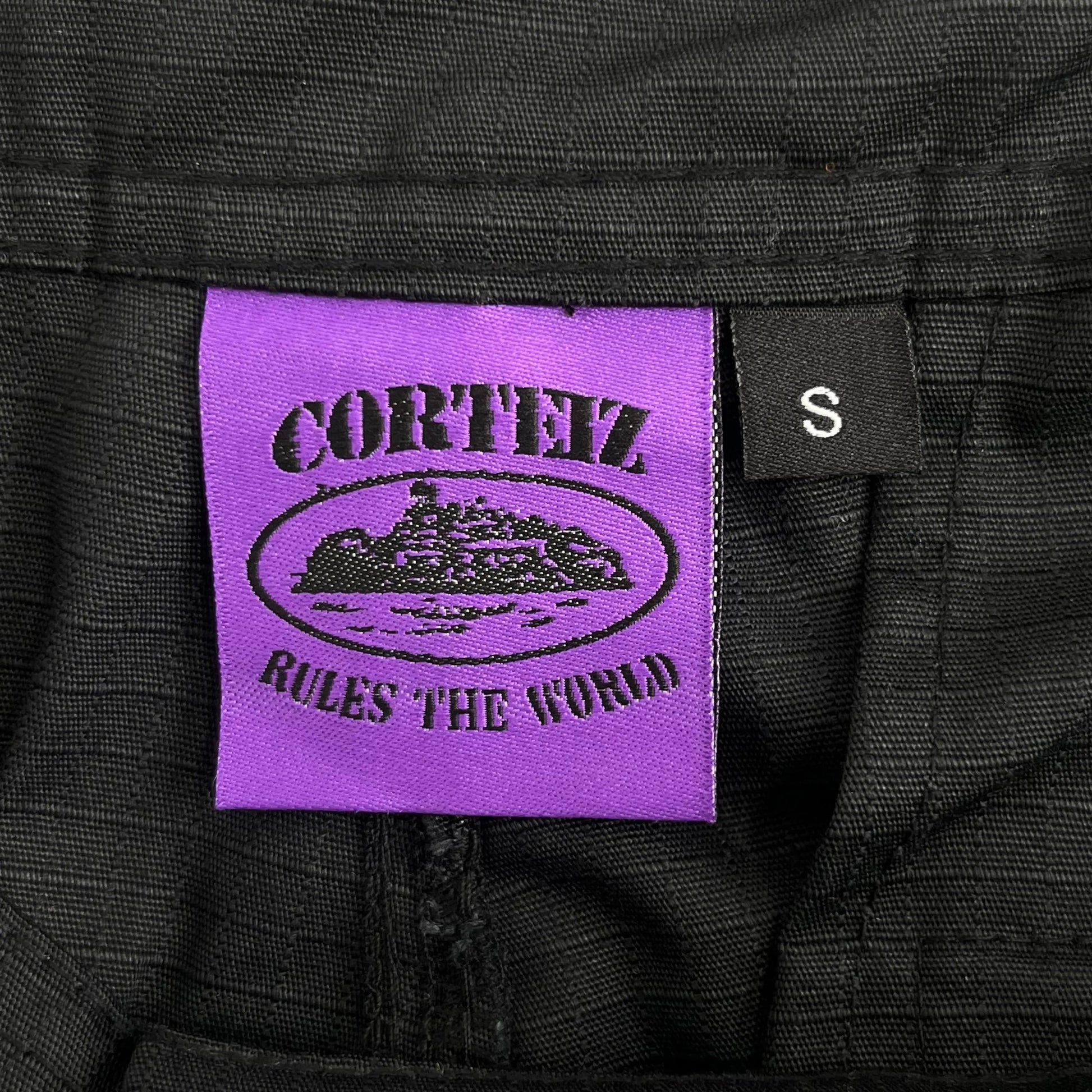 Corteiz | Black Cargo Pants with Purple or Pink Patch UndergroundDesignerPlug