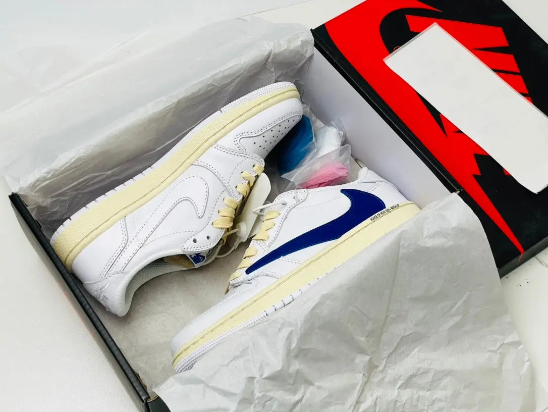 Jordan 1 Low | White and Blue Reverse Swoosh Jordan