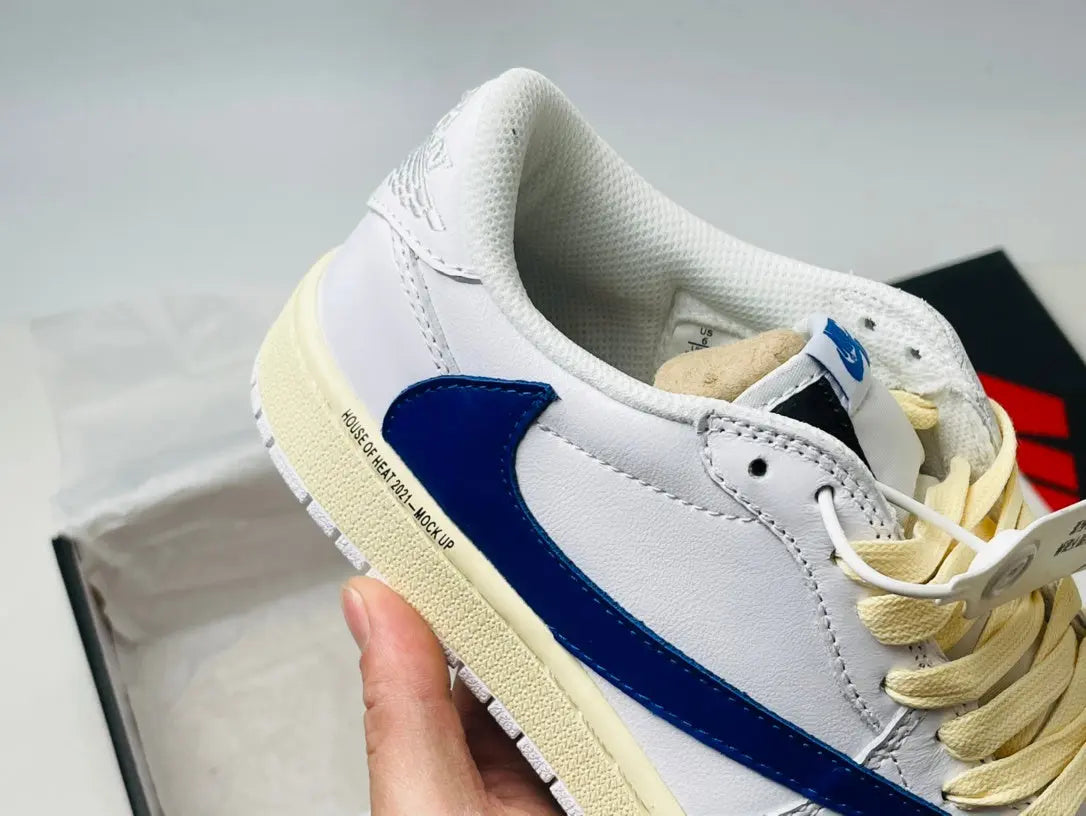 Jordan 1 Low | White and Blue Reverse Swoosh Jordan