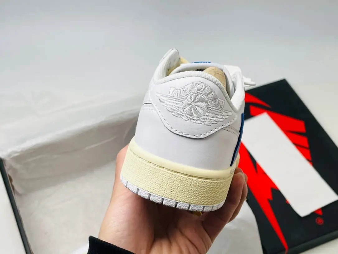 Jordan 1 Low | White and Blue Reverse Swoosh Jordan