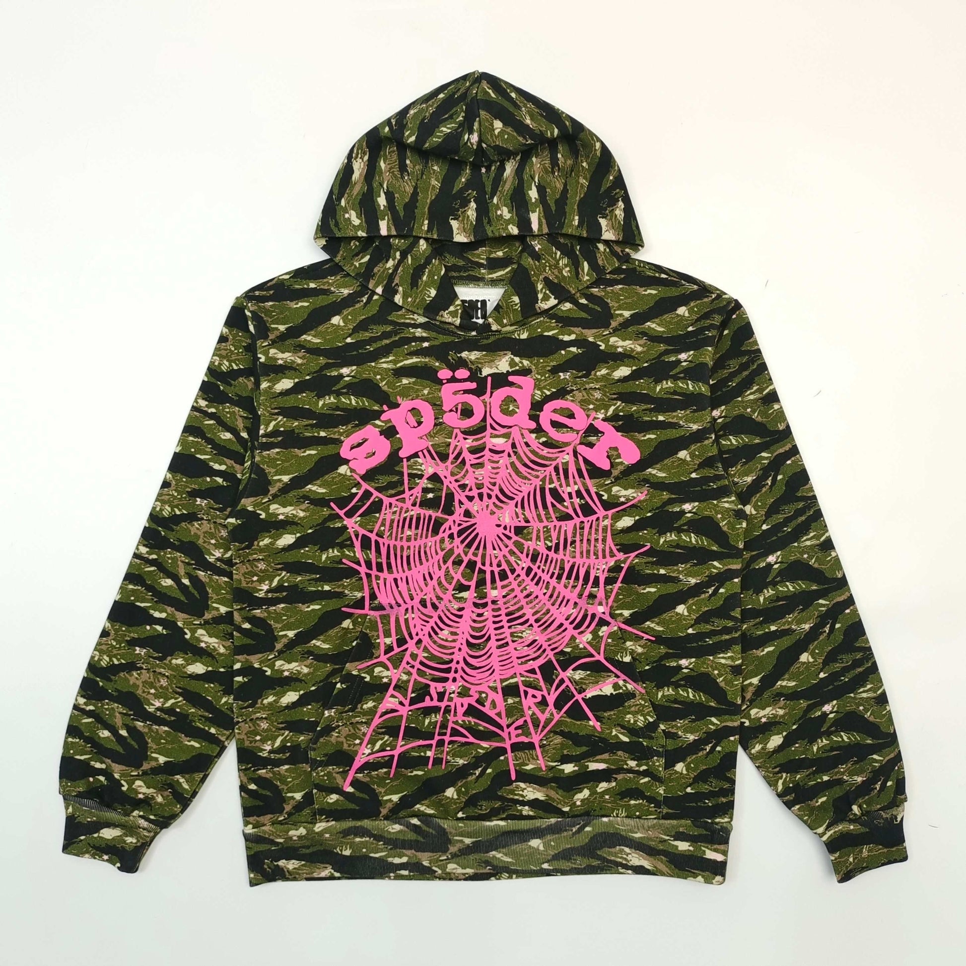 Camouflage hoodie with pink spider web design and text on a white background