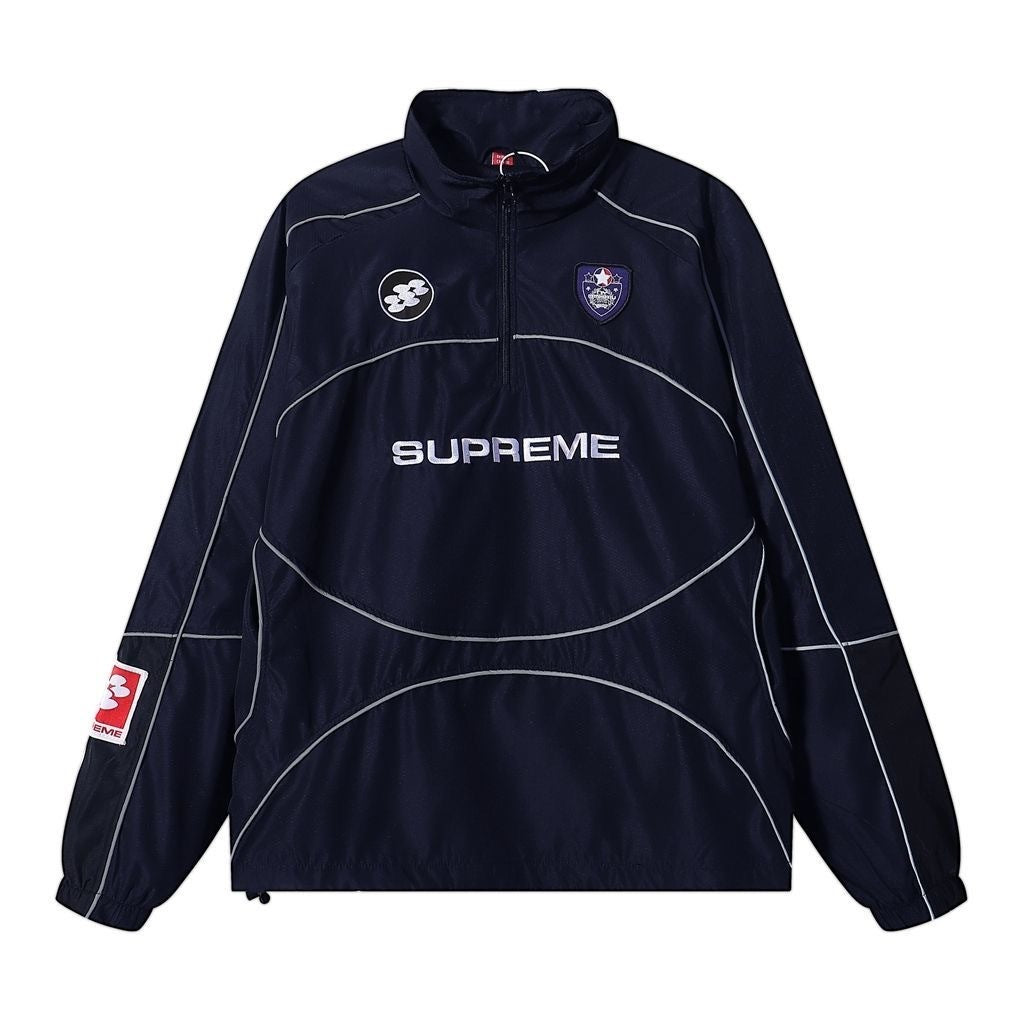 Navy blue jacket with white accents and Supreme logo on a white background