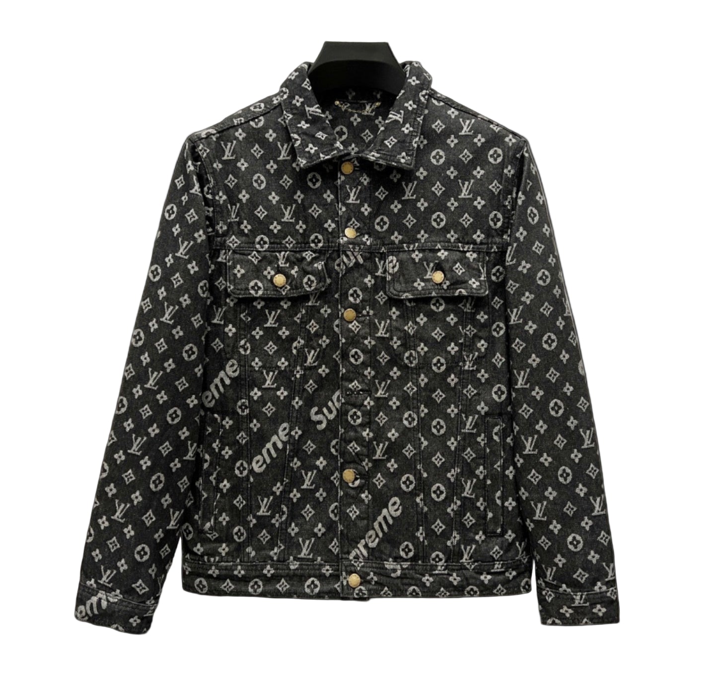 Supreme x Louis Vuitton monogram denim jacket in black with all-over LV and Supreme logo pattern, displayed on a hanger against a white background.