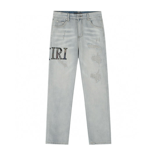 Amiri | MX1 Leather Patch Distressed Jeans | Indigo