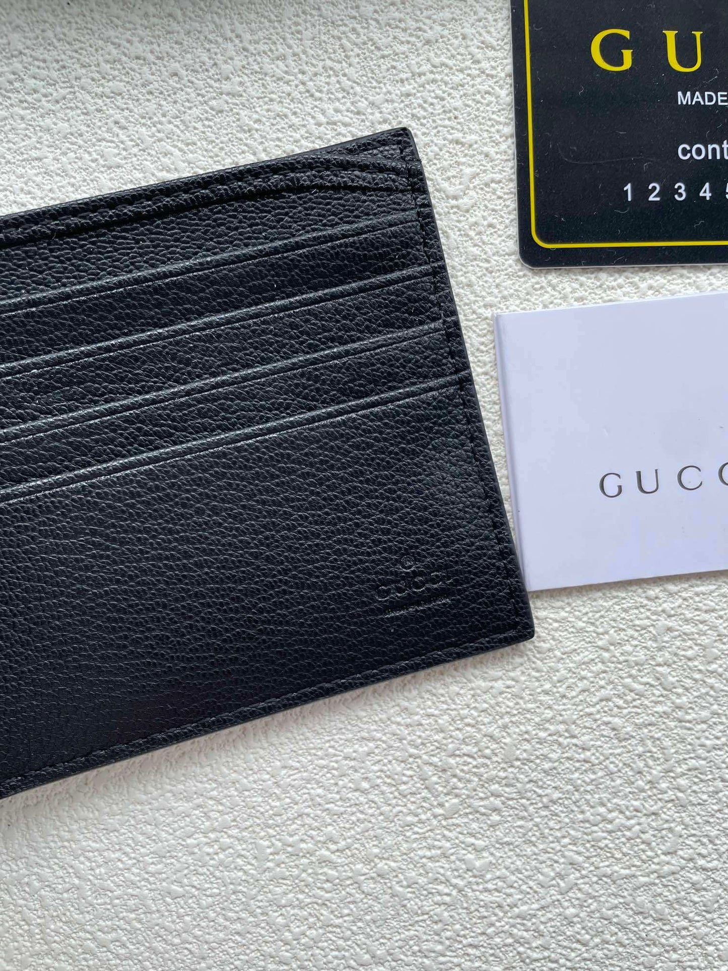 Gucci | GG Embossed Leather Wallet | Black with Web Stripe