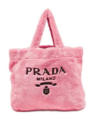 Pink Prada Milano tote bag on a white background