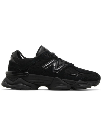 Black sneaker with a brand logo on a white background