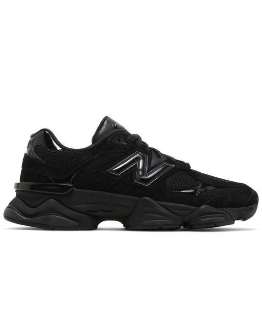 Black sneaker with a brand logo on a white background