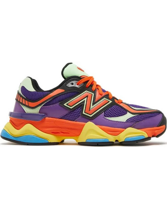 Multicolored sneaker with New Balance logo on a white background