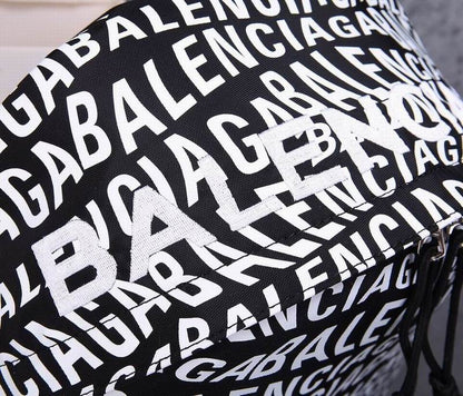 Balenciaga | Allover Logo Canvas Backpack