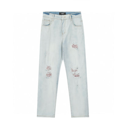 Amiri | MX1 Leather Patch Distressed Jeans | Indigo