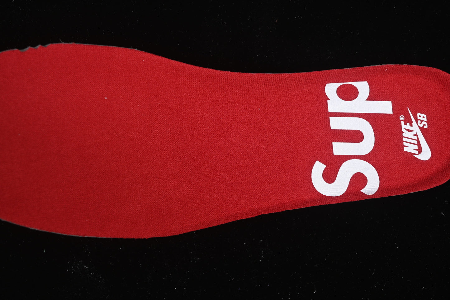 Nike x Supreme | SB Dunk Low “Black with Red Collar, 94 Heel”