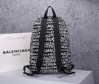 Balenciaga | Allover Logo Canvas Backpack