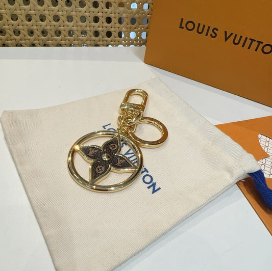 Louis Vuitton | Puzzle Flower Monogram Keyring in Gold