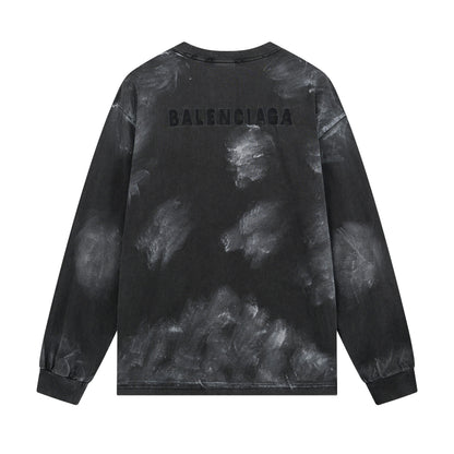 Black tie-dye long-sleeve shirt with 'Balenciaga' branding on a white background