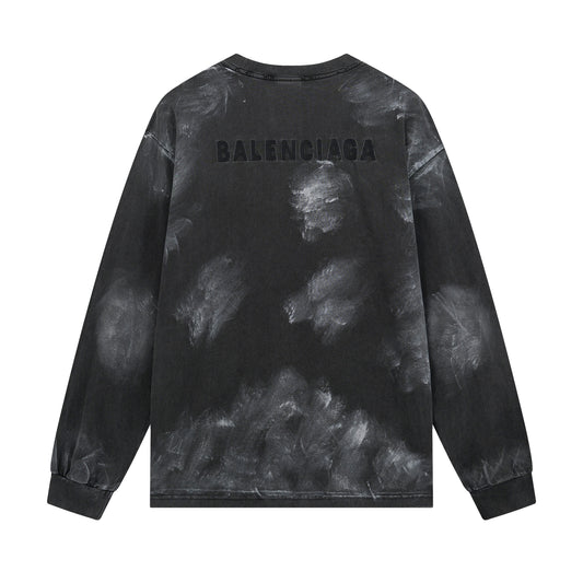 Black tie-dye long-sleeve shirt with 'Balenciaga' branding on a white background