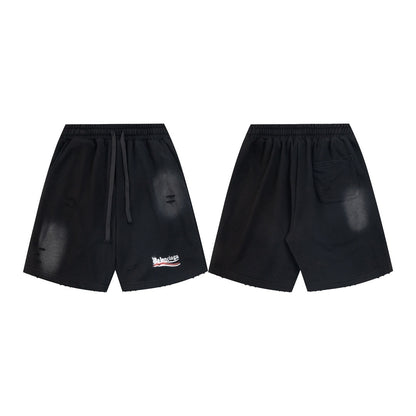 balenciaga Black shorts with a brand logo on a white background