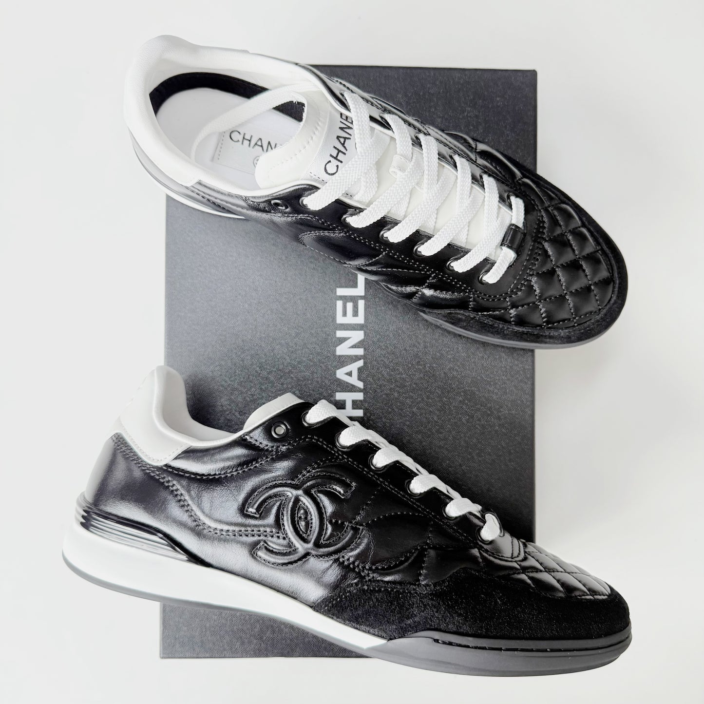 Chanel | CC Logo Sneakers | White or Black Colorways