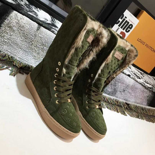 Louis Vuitton winter green boots, with fur