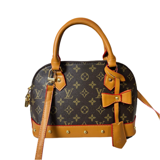 Louis Vuitton | Alma BB Monogram Vinyl Handbag