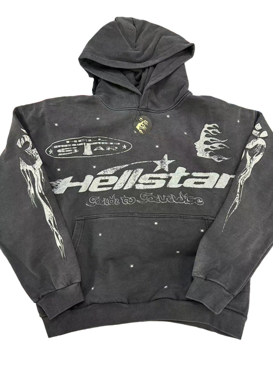 Black hoodie with 'Hellstar' branding on a colorful background