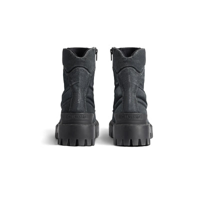 Balenciaga
Men's combat stike boot in Black Balenciaga