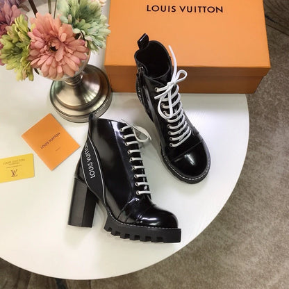 Louis Vuitton | Star Trail Patent Leather Ankle Boots | Black