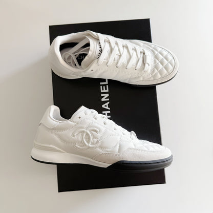 Chanel | CC Logo Sneakers | White or Black Colorways
