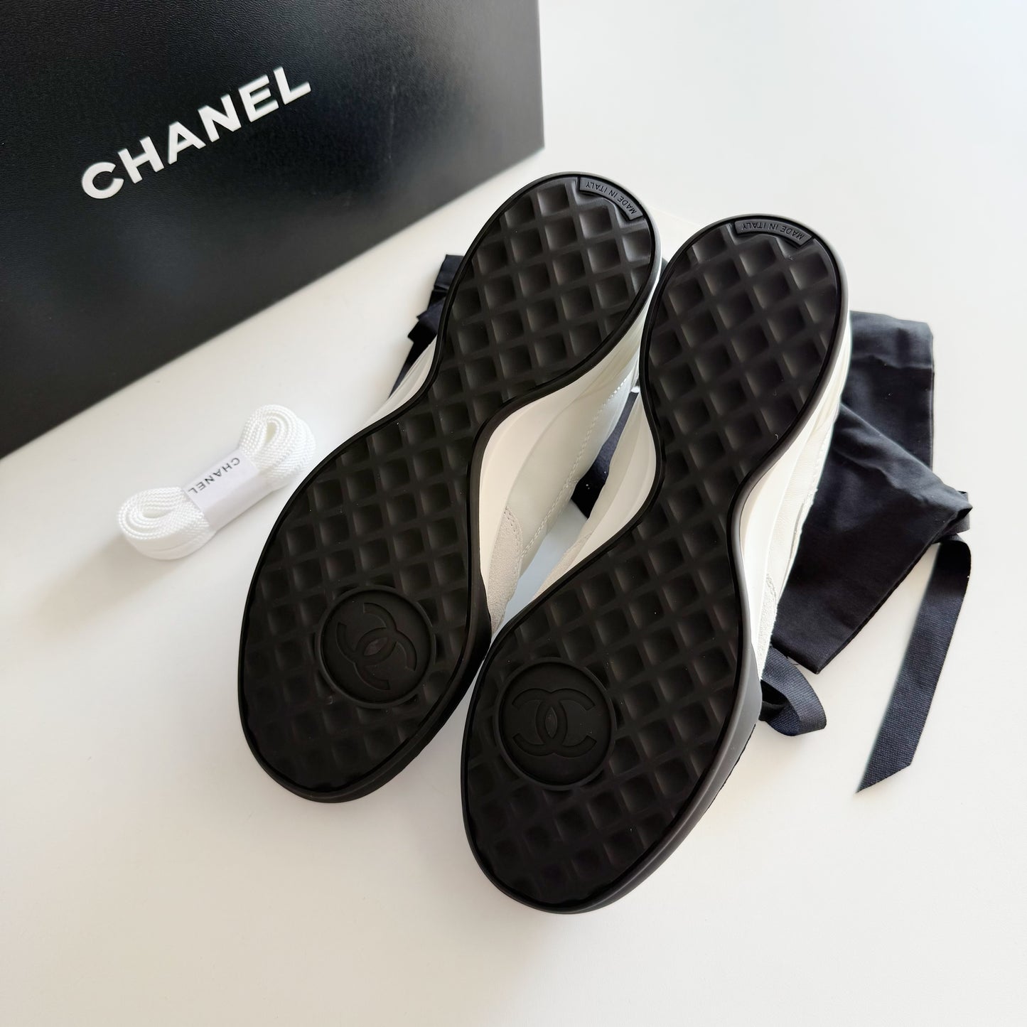 Chanel | CC Logo Sneakers | White or Black Colorways