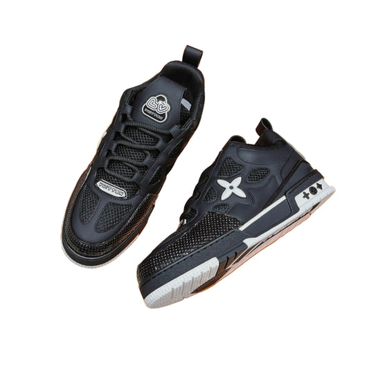 Black athletic shoes with white soles on a white background