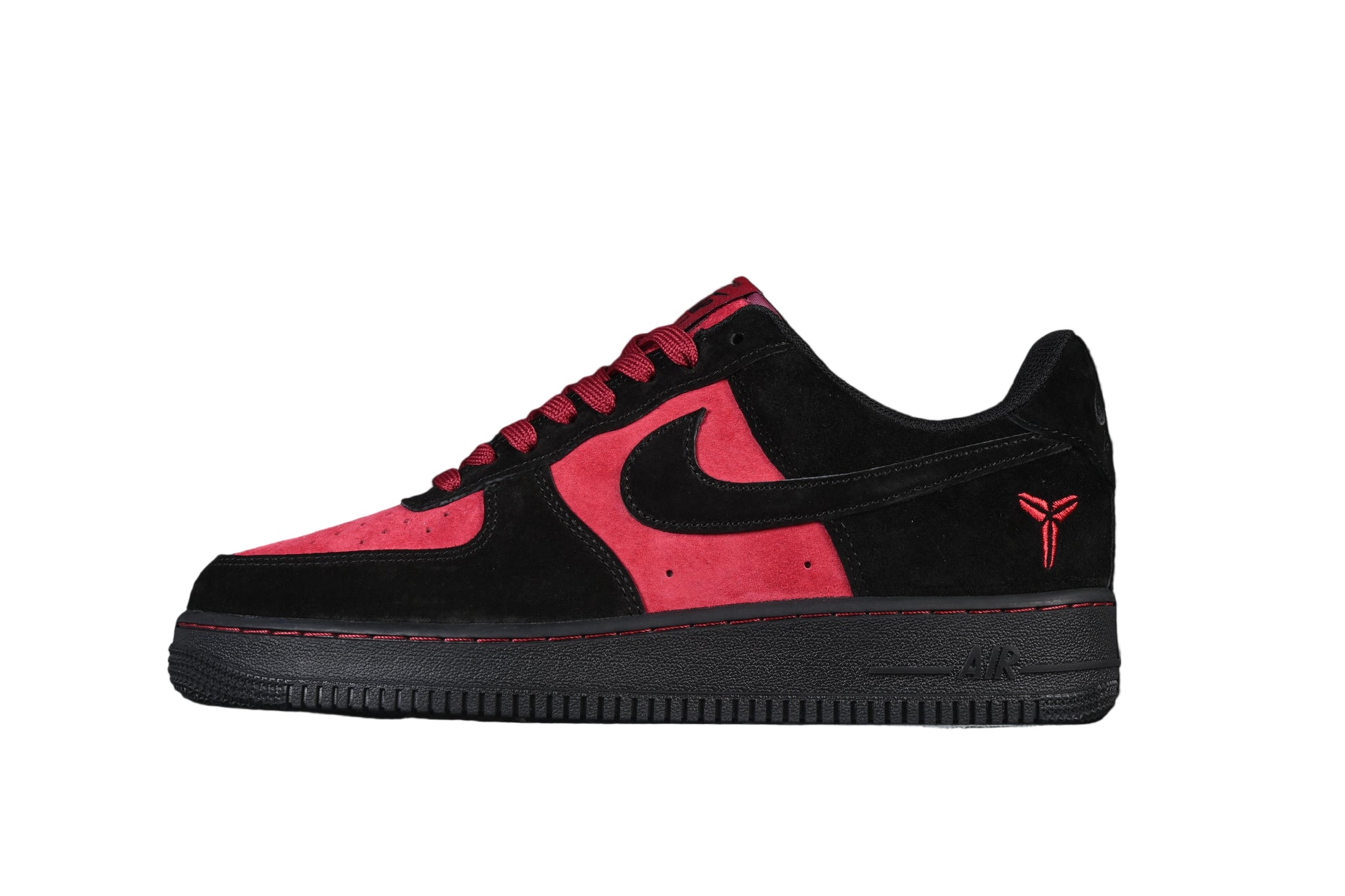 Black and red sneaker with Nike logo on a white background