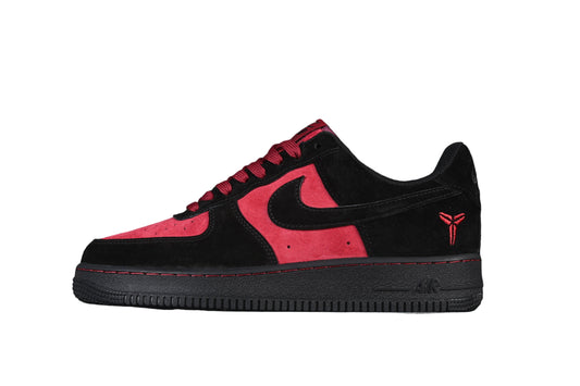 Black and red sneaker with Nike logo on a white background