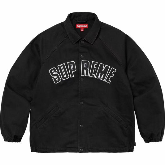 Supreme Arc Logo black coaches jacket with bold white arc lettering “SUPREME” across the chest, displayed flat on white background.
